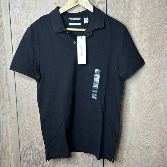 NWT Calvin Klein Jeans Black With Black Logo Polo Shirt Size X-Small - Picture 1 of 5